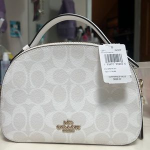 Brand new coach crossbody bag still have tag on it.